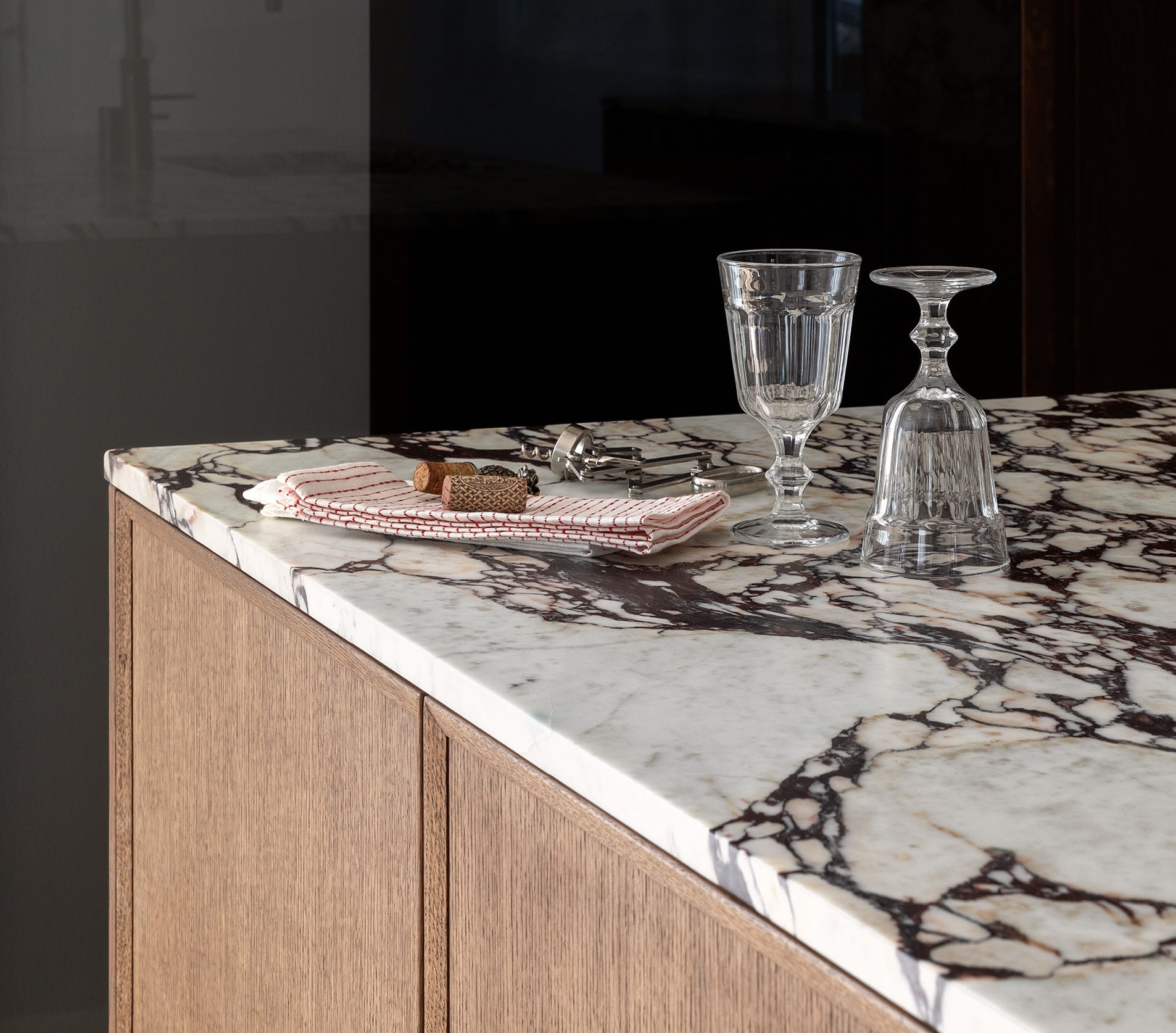 Calacatta Viola marble worktop on oak kitchen cabinets